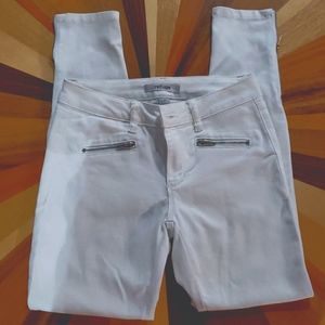 White skinny pants with side zippers